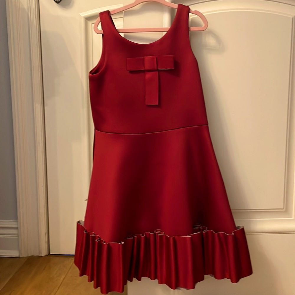 A kids sleeveless red dress